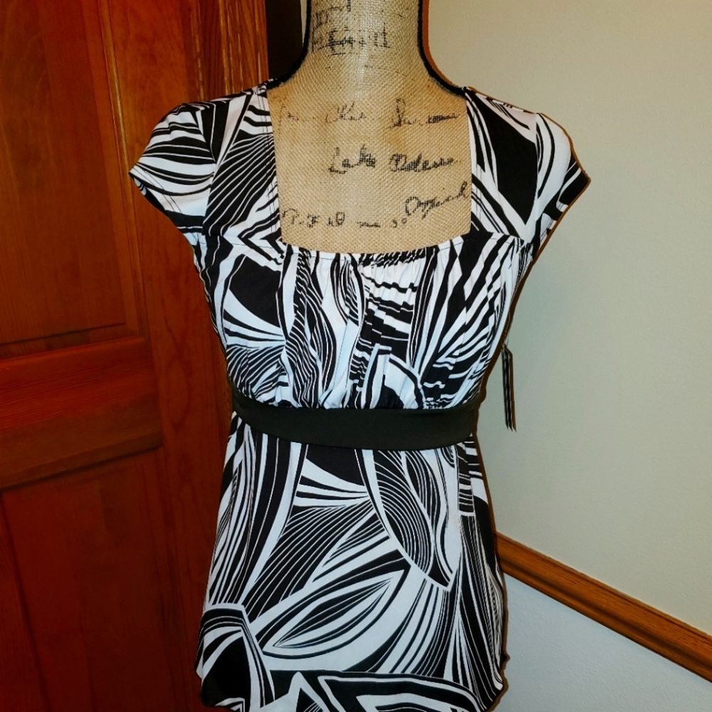 A. Byer brown and white top
